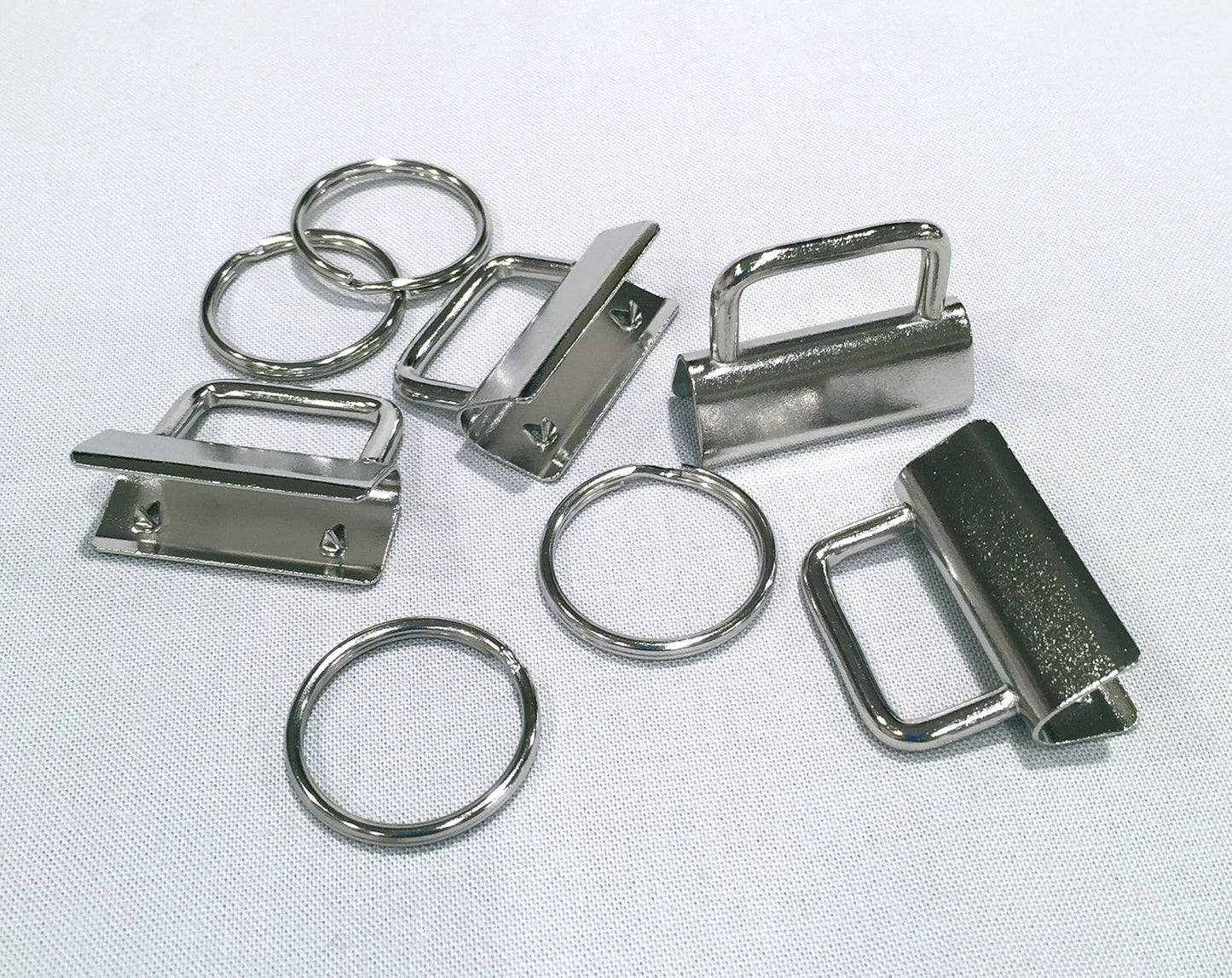 Collection of metal hardware components on a white background.
[additional_image_link]
