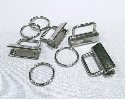 Collection of metal hardware components on a white background.
[additional_image_link]