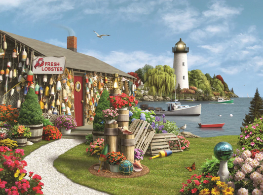 A completed jigsaw puzzle depicting a vibrant and colorful lobster cove scene with a lighthouse, buoys, and a fresh lobster sign.
Photo by Nautilus Puzzles [image_link]
