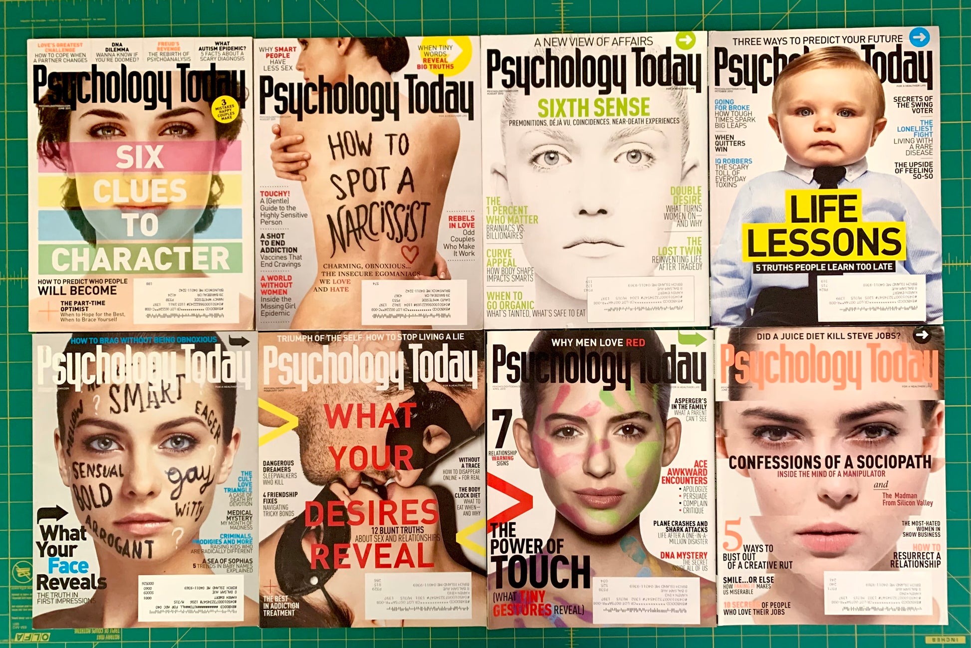 A set of eight Psychology Today magazine covers arranged in a 2x4 grid on a green cutting mat background. The covers feature various cover lines, quizzes, and portraits, with one cover showing a baby and another showing a face with a printed face map.
[image_link]
