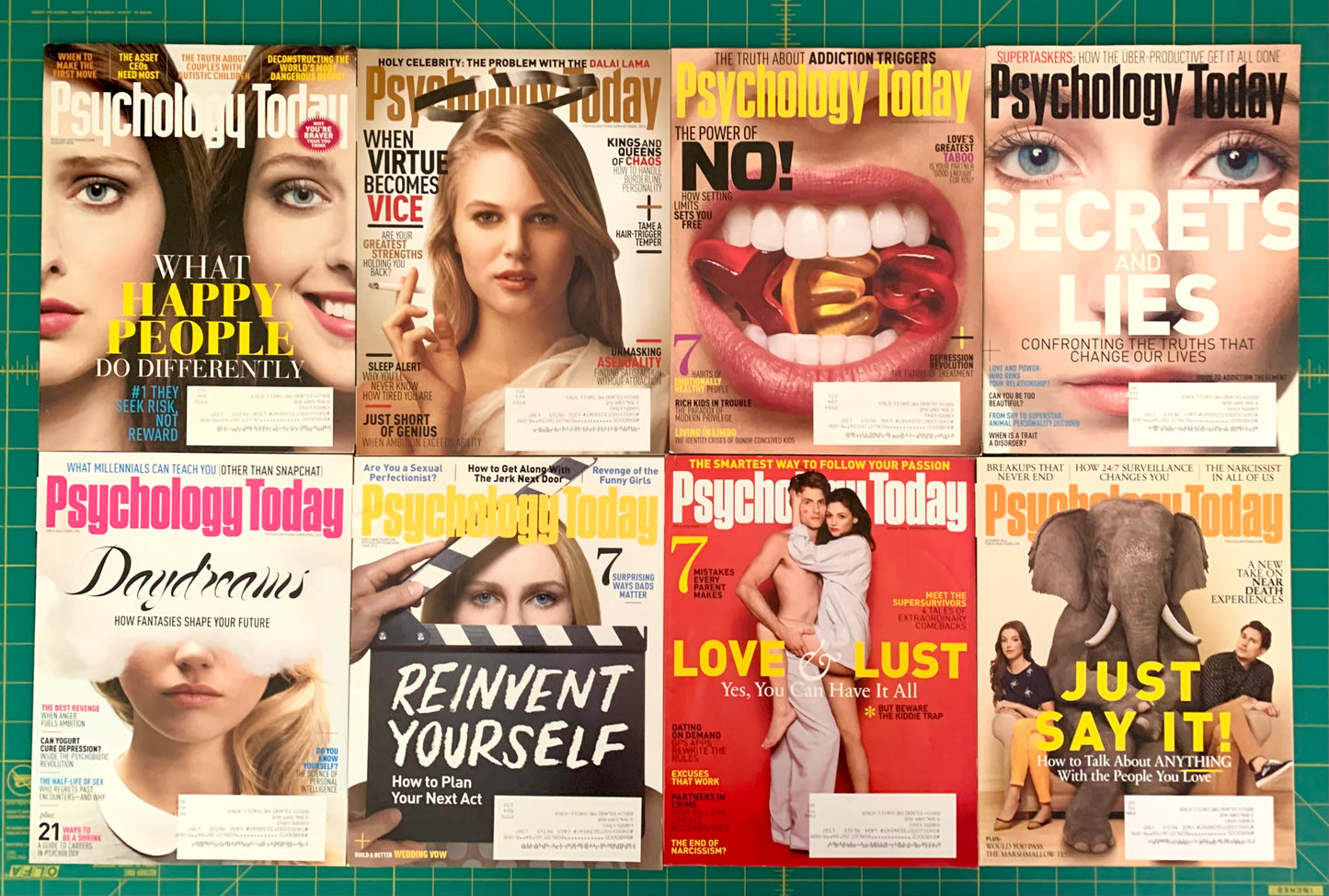 Eight Psychology Today magazine covers arranged in a 2x3 grid on a green cutting mat background. The covers feature various cover lines, photos, and illustrations, including a close-up face, a woman holding a phone, a mouth with a gold ring, a woman's eyes, a woman and a man, a woman with a elephant, and a clapperboard.
[additional_image_link]