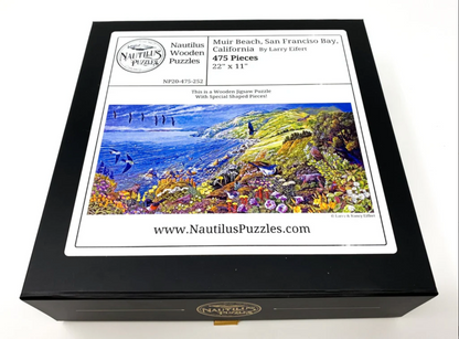 A completed jigsaw puzzle depicting a colorful coastal landscape with purple water, green hills, flying birds, and wildflowers in the foreground.
Photo by Nautilus Puzzles [additional_image_link]