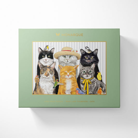 A completed jigsaw puzzle featuring a group portrait of six cats with small birds perched on them, set against a light patterned background.
Photo by Monarque [image_link]