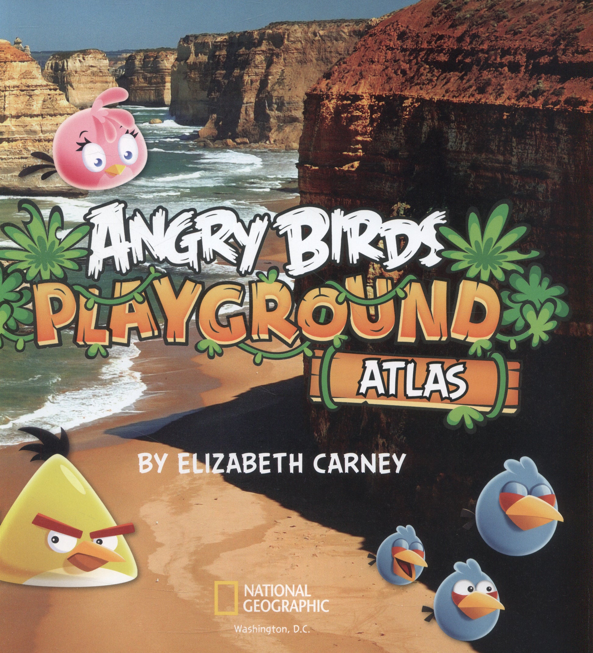 Front cover of the book 'Angry Birds Playground Atlas' by Elizabeth Carney, featuring a beach and coastal cliff scene with Angry Birds characters and the National Geographic logo.
[additional_image_link]