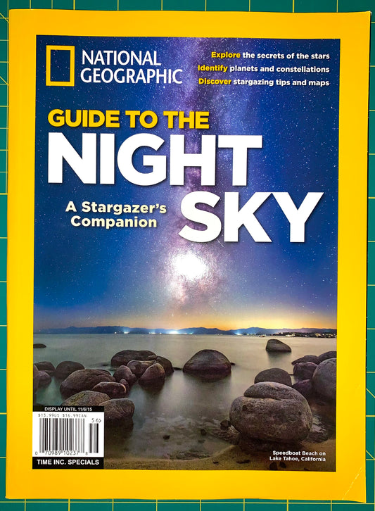 National Geographic magazine cover featuring the headline 'Guide to the Night Sky' with a night-sky landscape photo and rocky shoreline, framed by the signature yellow border.
[image_link]