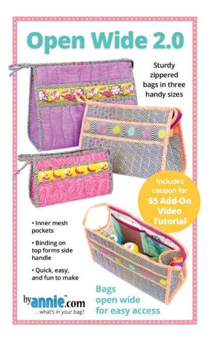 Promotional graphic for the 'Open Wide 2.0' sewing pattern, showing three different colored and patterned zippered bags with text describing features and a '$5 Add-On Video Tutorial' offer byannie.
Photo by Annie [image_link]