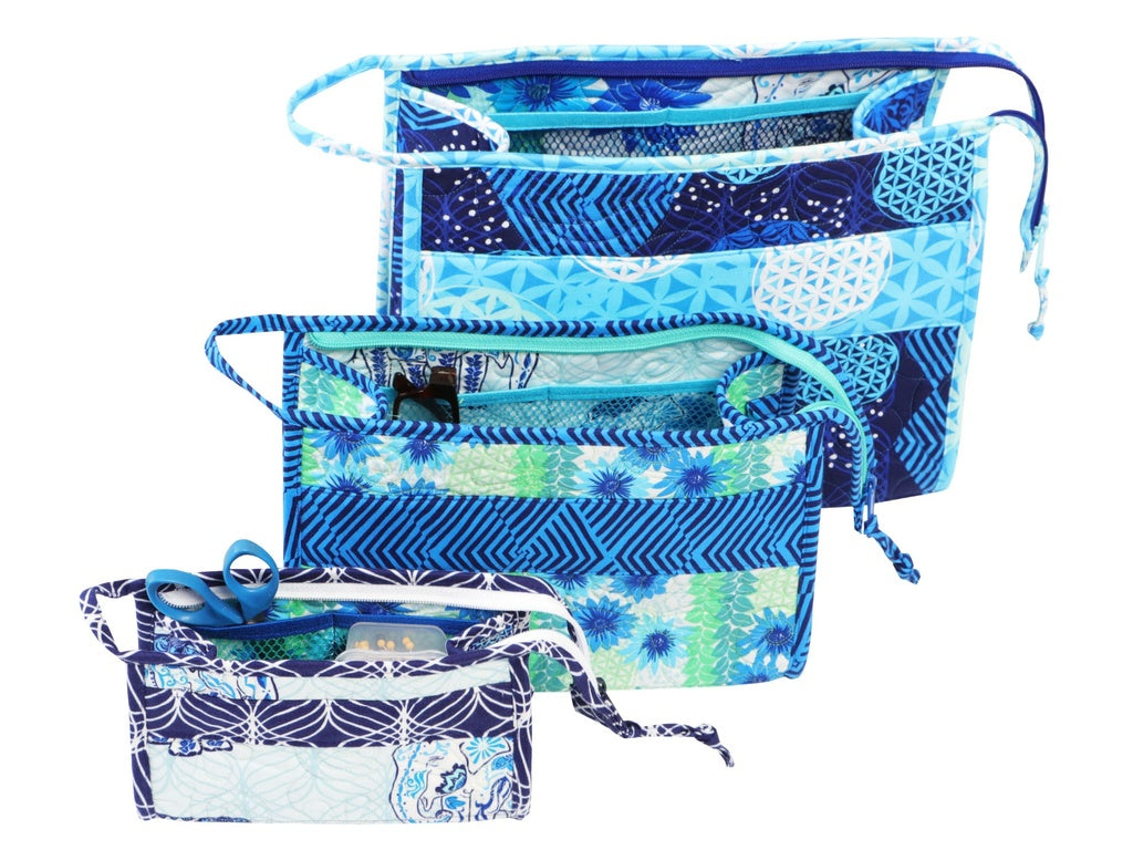 Set of blue patterned bags on a white background.
Photo by Annie [additional_image_link]