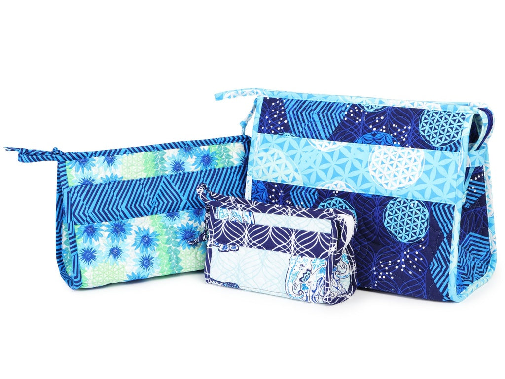 Set of three fabric bags with blue and white patterns on a white background.
Photo by Annie [additional_image_link]