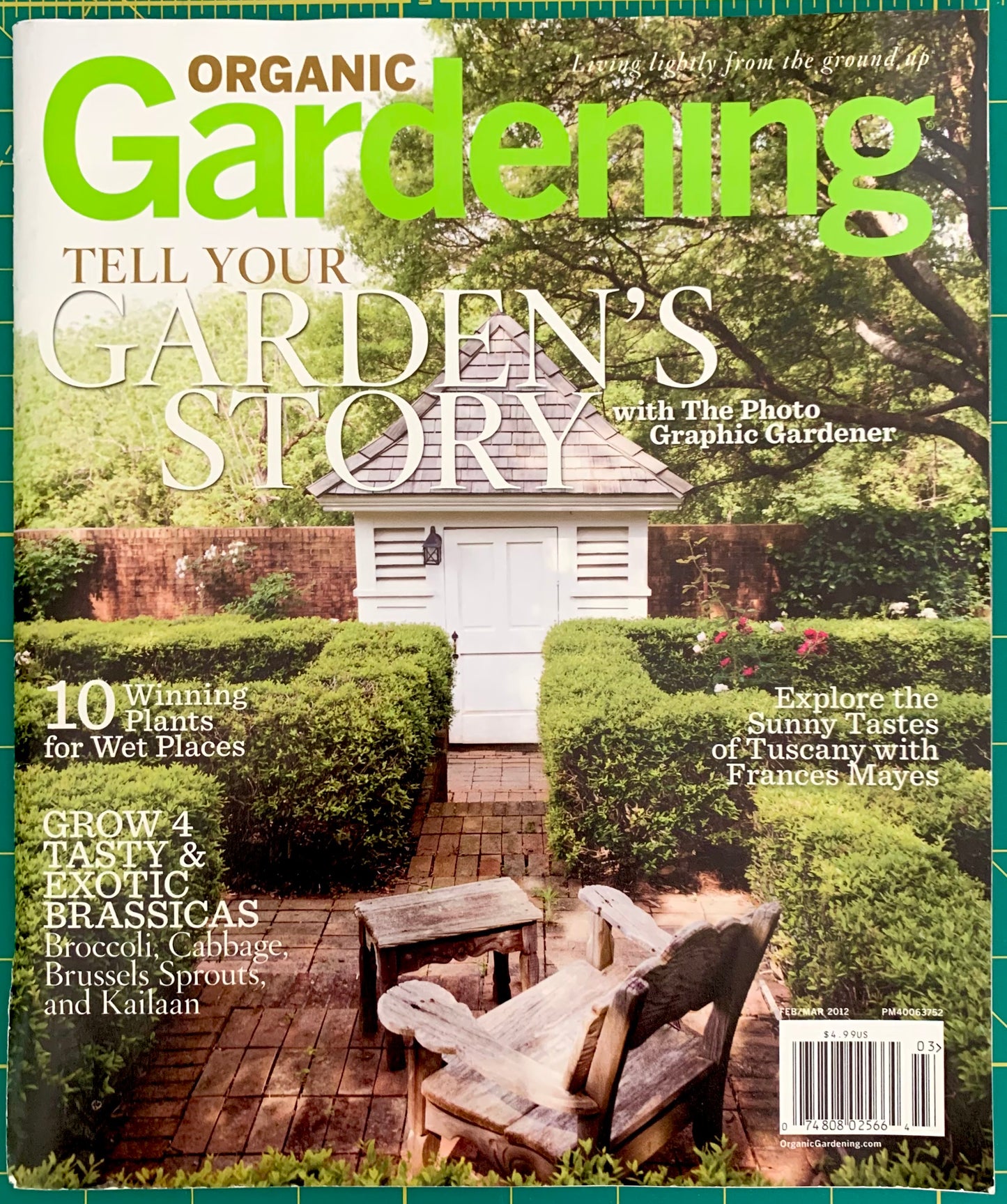 Front page of Organic Gardening magazine with hedges and a small white shed. 'Tell your Garden's Story' with large type.
[image_link]