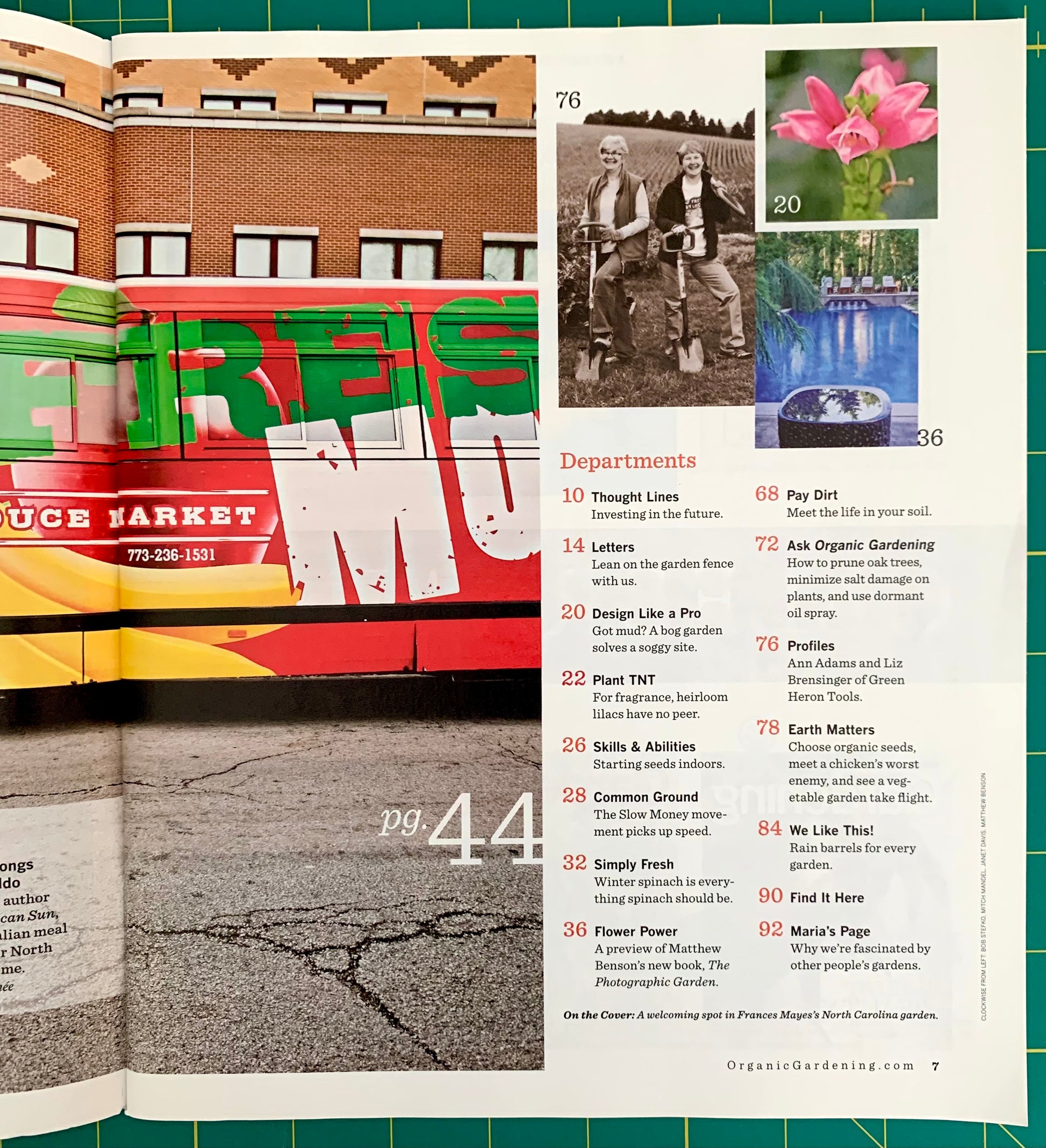 An open book or magazine spread showing printed pages with text, small photos, and a colorful mural or poster on the left page. The right page contains department headings, page numbers, and a pink flower photo.
[additional_image_link]