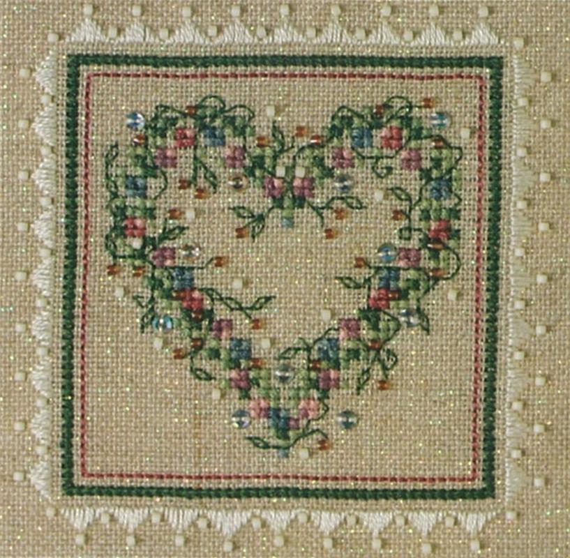 A cross stitch embroidery kit packaging from The Sweetheart Tree featuring a heart-shaped design with floral patterns.
Photo by The Sweetheart Tree [additional_image_link]