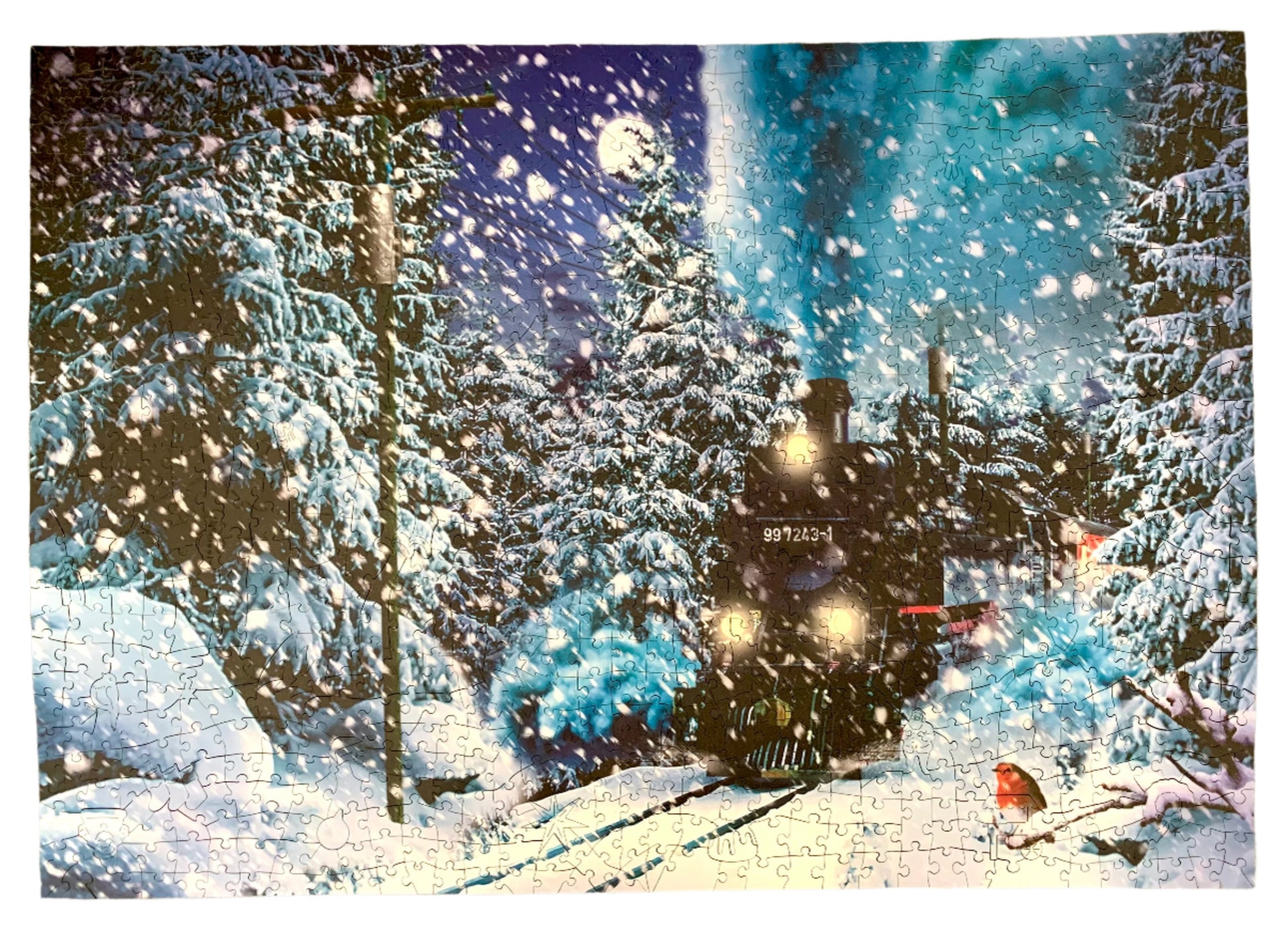 A pre-owned wooden jigsaw puzzle depicting a scene with a train and snow-covered trees, with puzzle pieces scattered around.
Photo by Karen King [image_link]