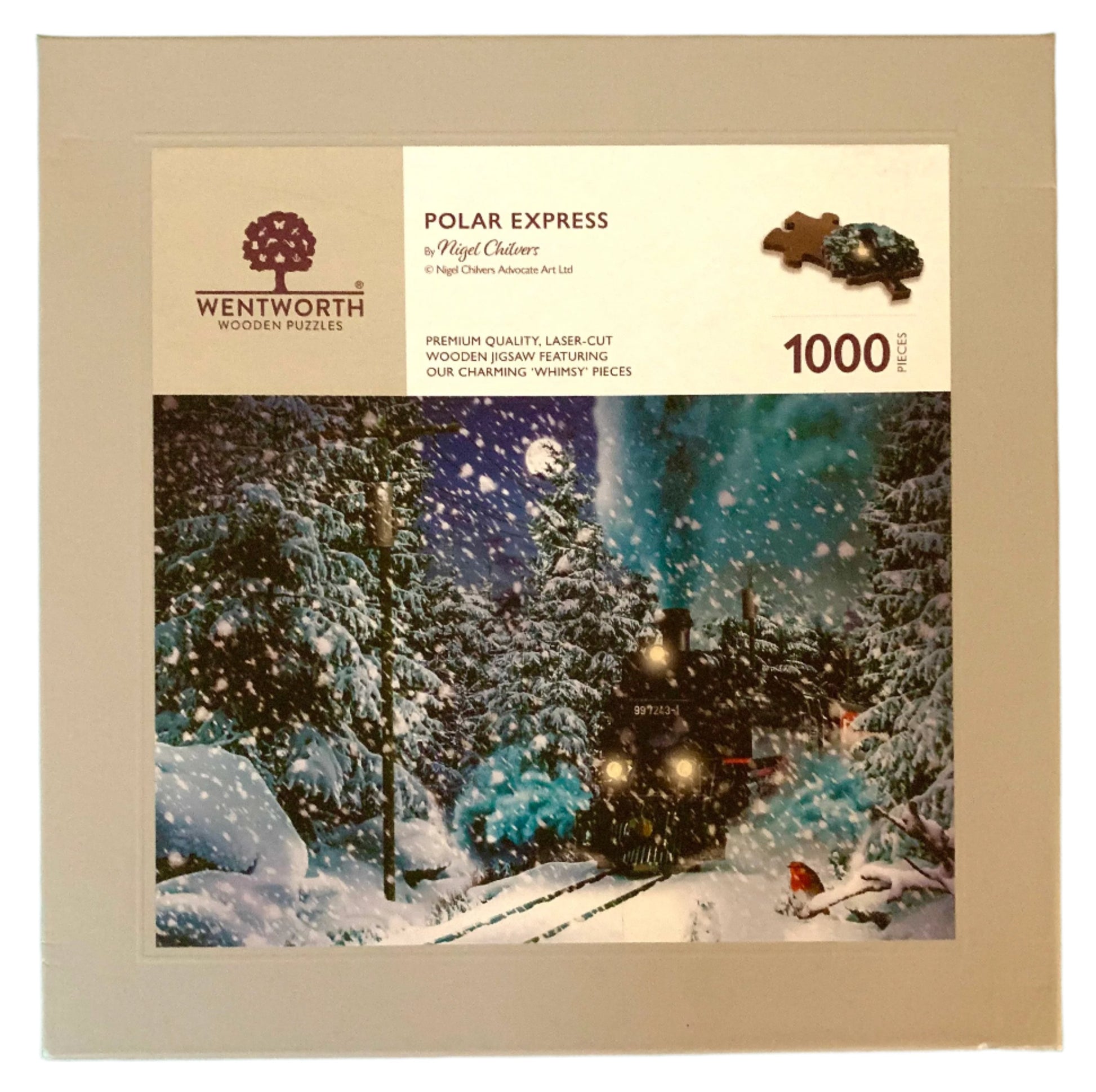 A pre-owned wooden jigsaw puzzle depicting a scene with a train and snow-covered trees, with puzzle pieces scattered around.
Photo by Karen King [additional_image_link]