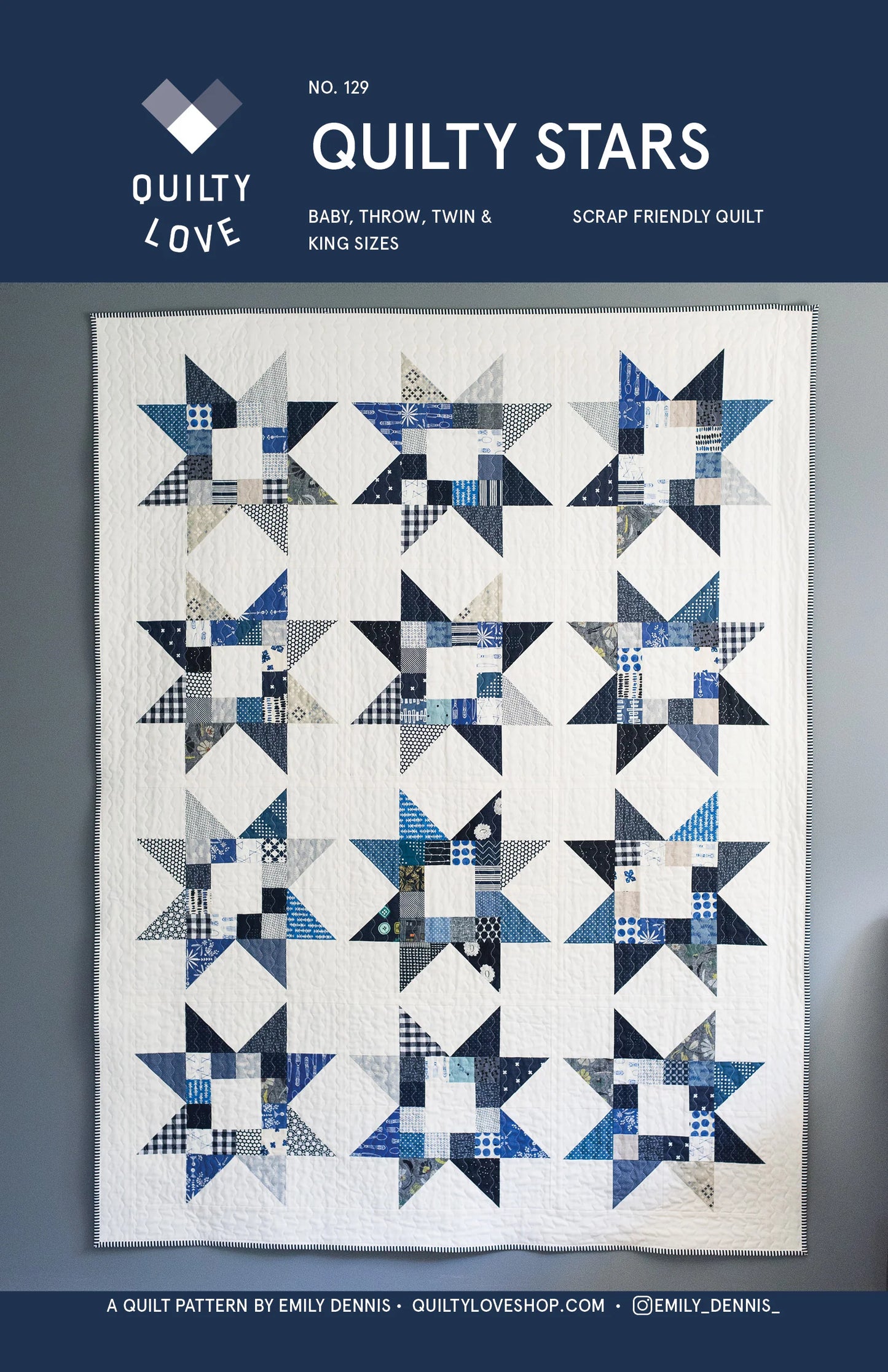 A quilt pattern cover for 'Quilty Stars' by Emily Dennis, showing a completed quilt with a geometric star and diamond patchwork design in shades of blue, navy, white, and gray. The top header is navy blue with white text.
Photo by Quilty Love [image_link]