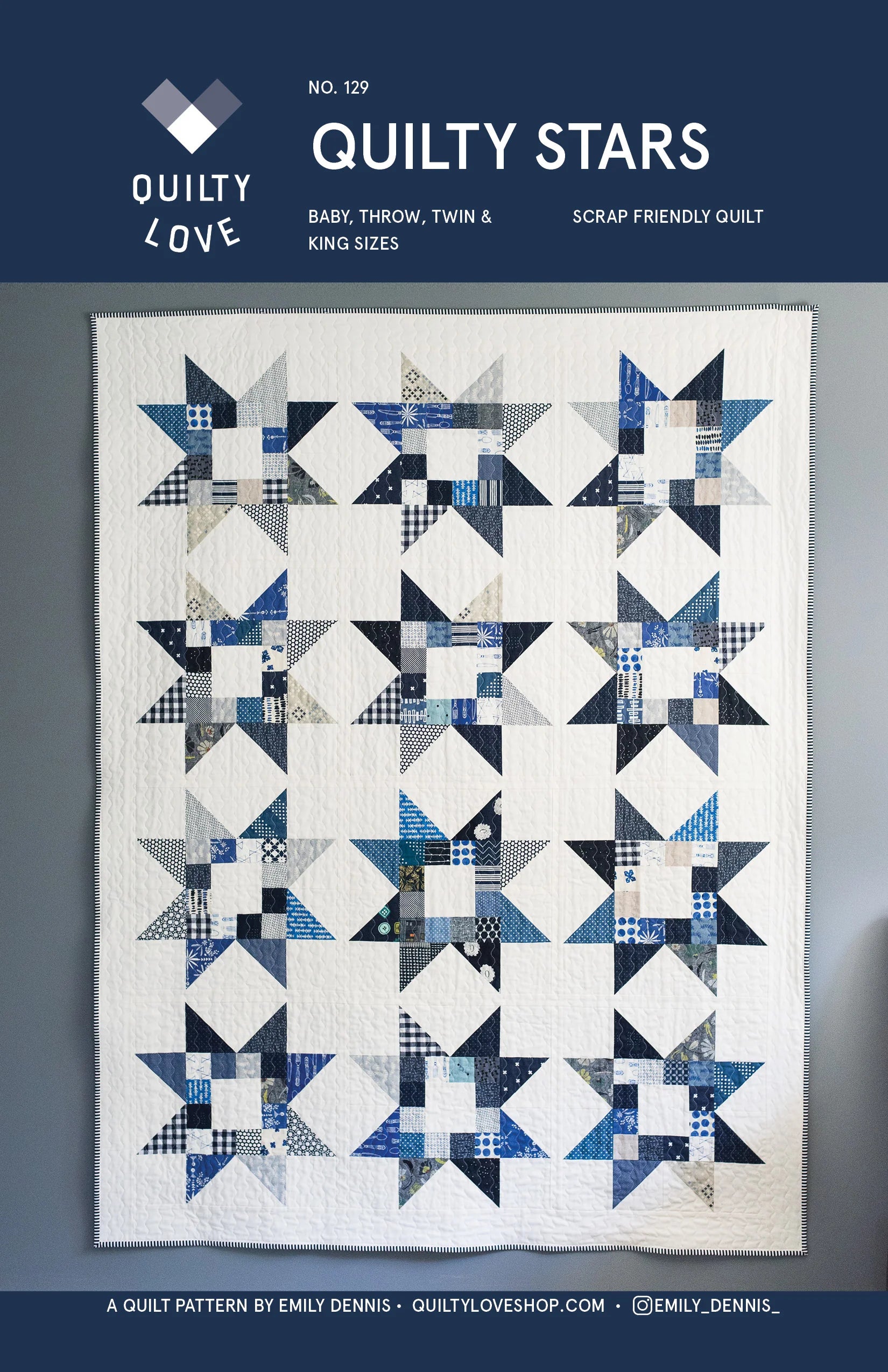 A quilt pattern cover for 'Quilty Stars' by Emily Dennis, showing a completed quilt with a geometric star and diamond patchwork design in shades of blue, navy, white, and gray. The top header is navy blue with white text.
Photo by Quilty Love [image_link]