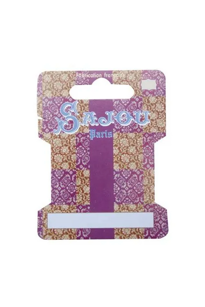 A decorative hanging  ribbon card with a purple and beige patterned design, featuring the stylized text 'Sajou Paris' across the top and a blank white label area at the bottom.
Photo by Sajou.fr [additional_image_link]