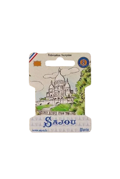 The illustration on this collectible embroidery ribbon storage card from Maison Sajou depicts the famous Basilica of the Sacré-Cœur de Montmartre.
Photo by Sajou.fr [additional_image_link]