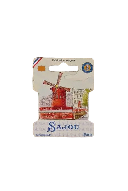 This is a cardboard ribbon storage card featuring a watercolor illustration of the Moulin Rouge.
Photo by Sajou.fr [additional_image_link]