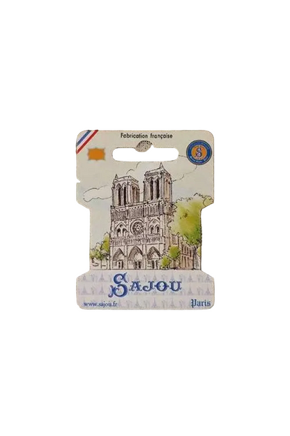 A small souvenir Ribbon card featuring an illustration of Notre Dame de Paris, on a white background. The card includes the text 'S.
Photo by Sajou.fr [additional_image_link]