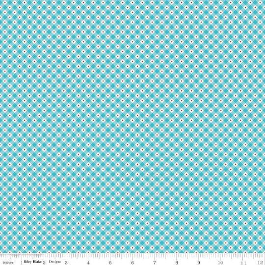 A fat quarter bundle of quilt fabric featuring a geometric pattern in various shades of blue.
Photo by RileyBlakeDesigns.com [additional_image_link]