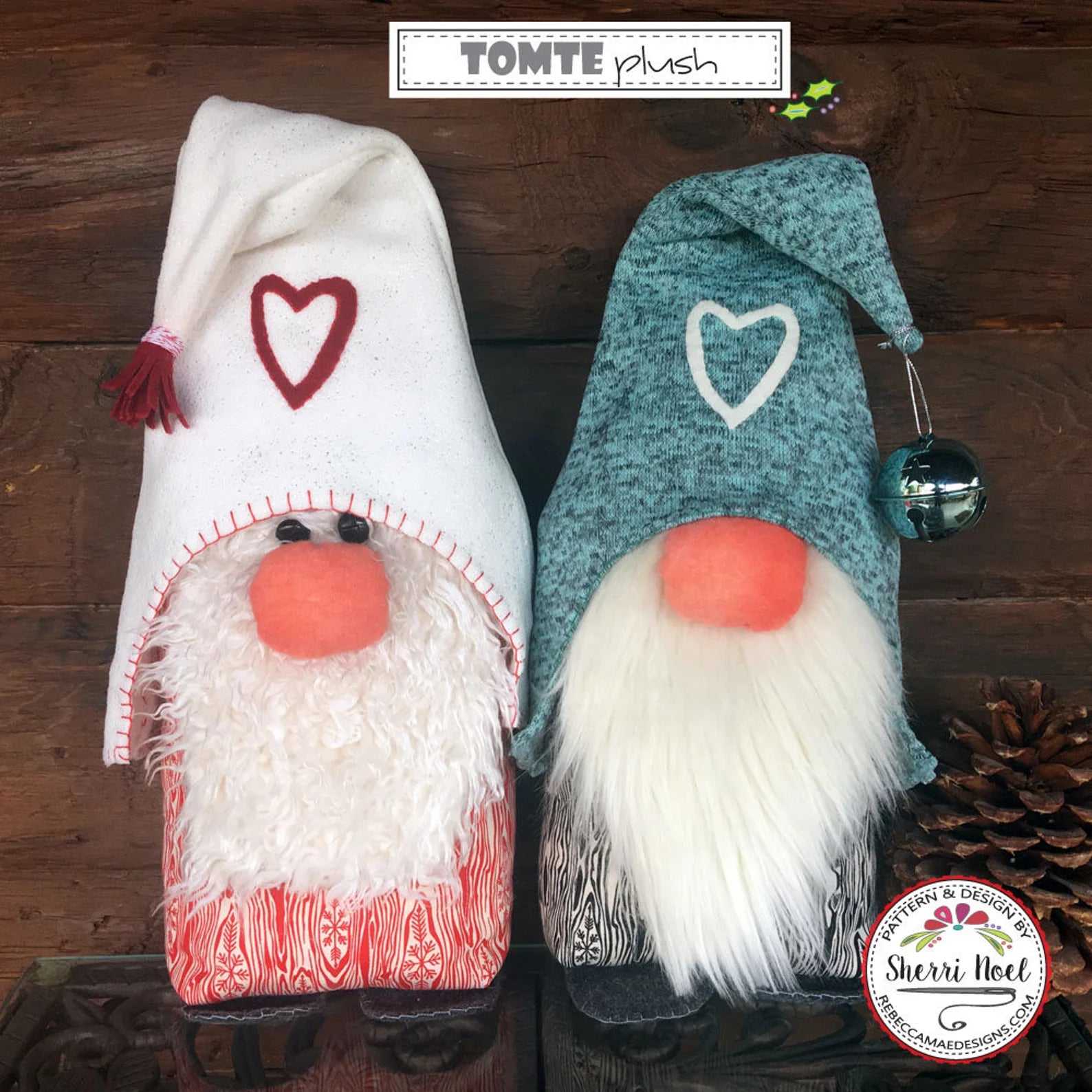 Two plush Christmas gnome decorations displayed side by side on a dark wooden surface. The left gnome wears a white hat with a red heart and a fluffy white beard.
Photo by Sherri Noel [additional_image_link]