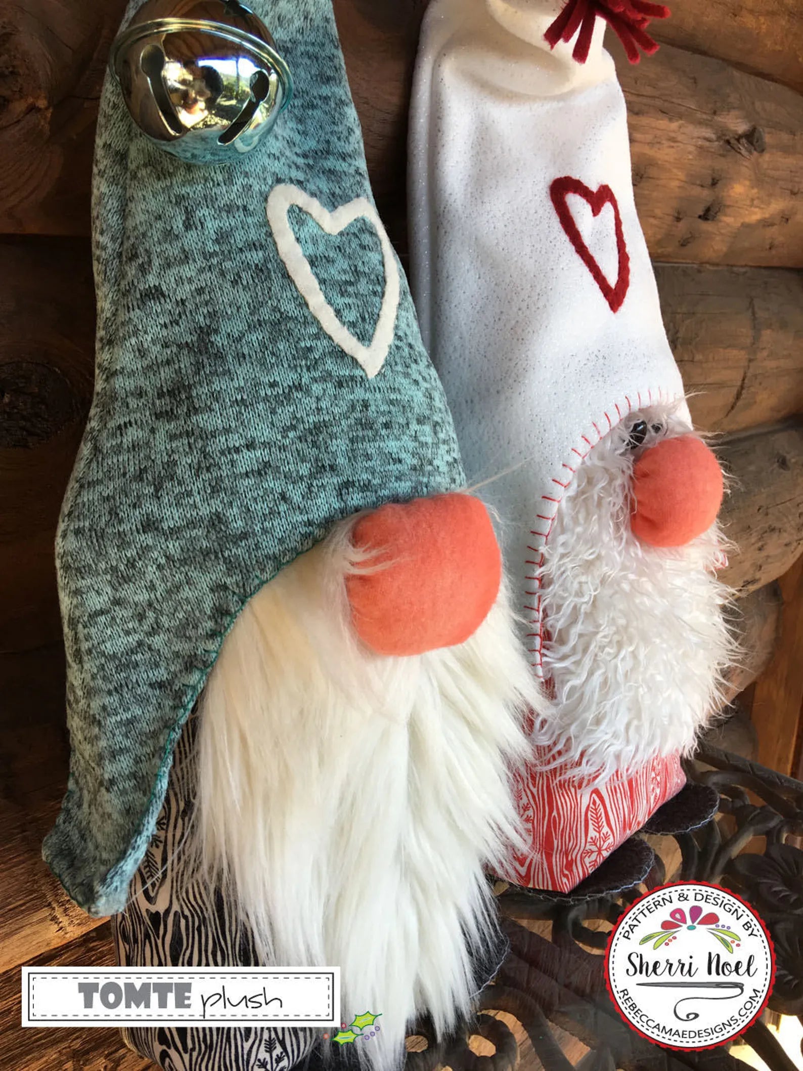 Two Christmas gnome stockings displayed on a rustic wooden surface. The left stocking is teal with a white heart, orange nose, and white beard.
Photo by Sherri Noel [additional_image_link]