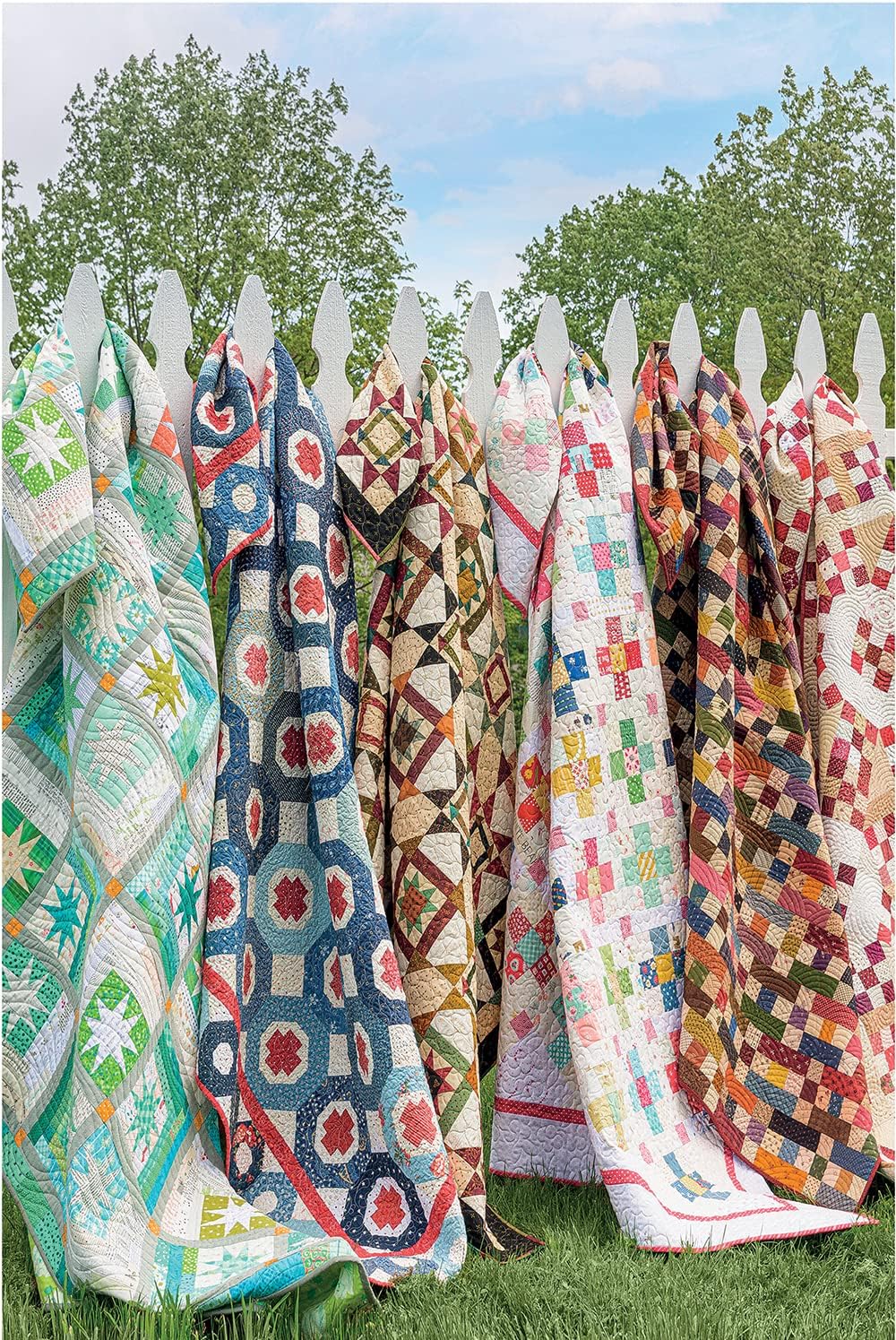 A collection of jigsaw puzzle pieces with various quilt patterns, assembled together to form a larger image.
Photo by Martingale [image_link]