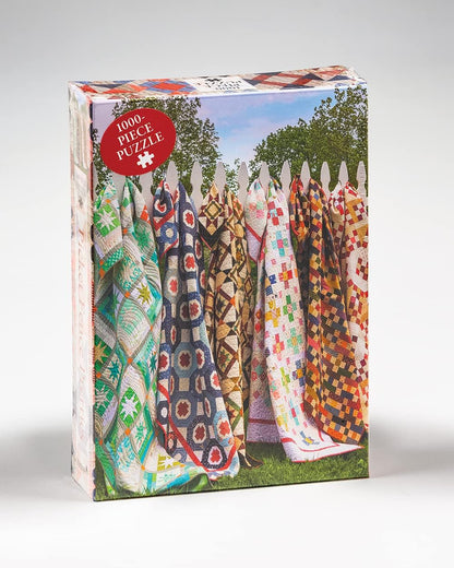 A collection of jigsaw puzzle pieces with various quilt patterns, assembled together to form a larger image.
Photo by Martingale [additional_image_link]
