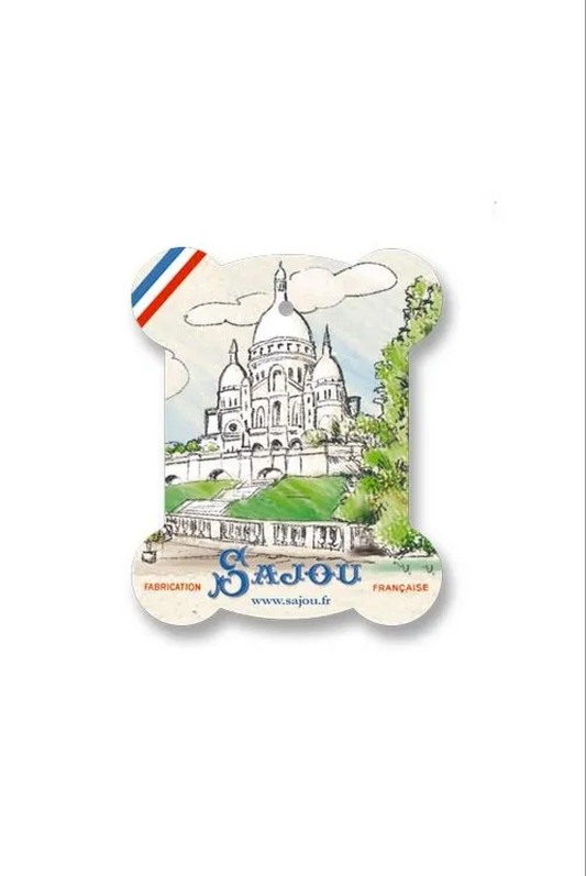 A multilingual thread card featuring the Arc de Triomphe and the brand name 'Sajou' on the bottom right.
Photo by Sajou.fr [image_link]
