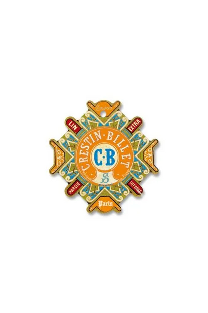 A vintage-style decorative thread card with the text 'Crestin-Billet' and 'CB S Paris,' featuring ornate green, gold, red, and blue details, placed on a white background.
Photo by Sajou.fr [additional_image_link]
