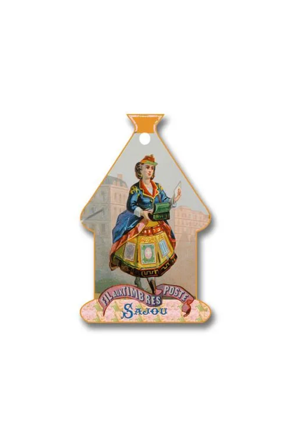 A vintage house-shaped thread card featuring an illustrated woman in a blue and red dress holding a green book, with the text 'Fil aux Timbres Poste Sajou' at the bottom, placed on a white background.
Photo by Sajou.fr [additional_image_link]