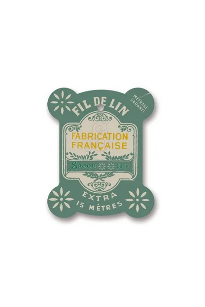 A vintage French thread card reading 'FIL DE LIN FABRICATION FRANÇAISE' and 'EXTRA 15 MÈTRES' in teal and cream, placed on a white background with yellow grid lines.
[additional_image_link]
