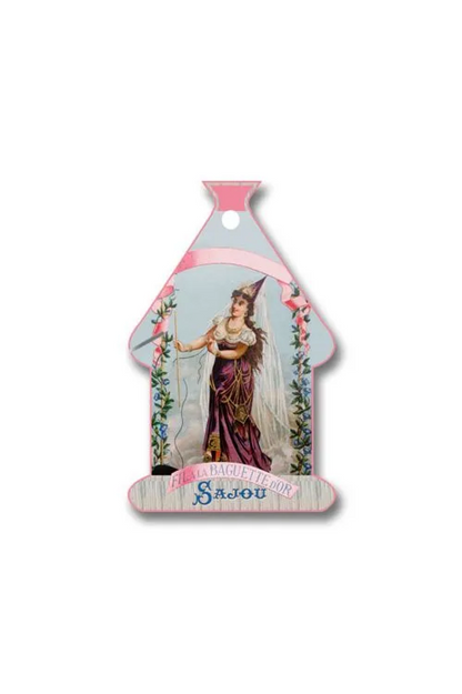 A vintage-style decorative house-shaped thread card featuring an illustration of a woman in a purple gown and a pink border, with the name 'Sajou' written at the bottom, displayed on a white background.
Photo by Sajou.fr [additional_image_link]
