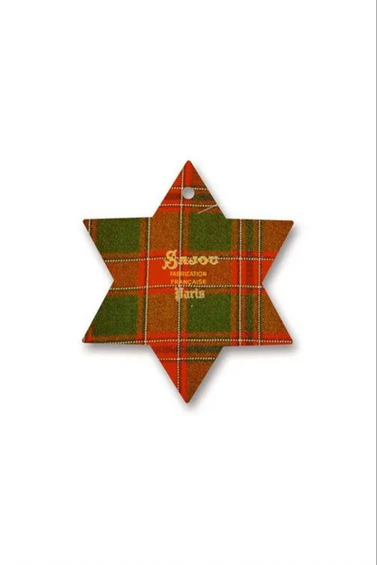 A six-pointed star-shaped thread card featuring a red and green tartan plaid pattern, with 'Sajou' printed in gold text in the center and a small hanging hole at the top.
Photo by Sajou.fr [additional_image_link]