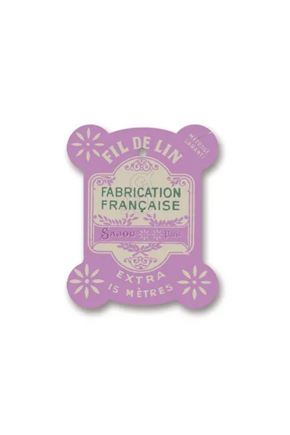 A vintage pink paper thread card for 'Fils de Lin', featuring 'Fabrication Francaise' and 'Extra 15 Mètres' in French, placed on a white background.
Photo by Sajou.fr [additional_image_link]