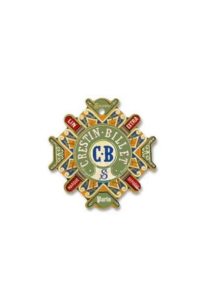 A vintage-style decorative thread card with the text 'Crestin-Bliss' and 'CB S Paris,' featuring ornate green, gold, red, and blue details, placed on a white background.