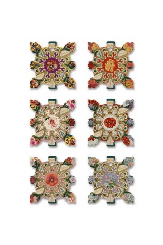 A set of six Elbeuf cross-stitch patterns, featuring a floral border and a central label showing six detailed floral designs, set against a white background.
Photo by Sajou.fr [image_link]
