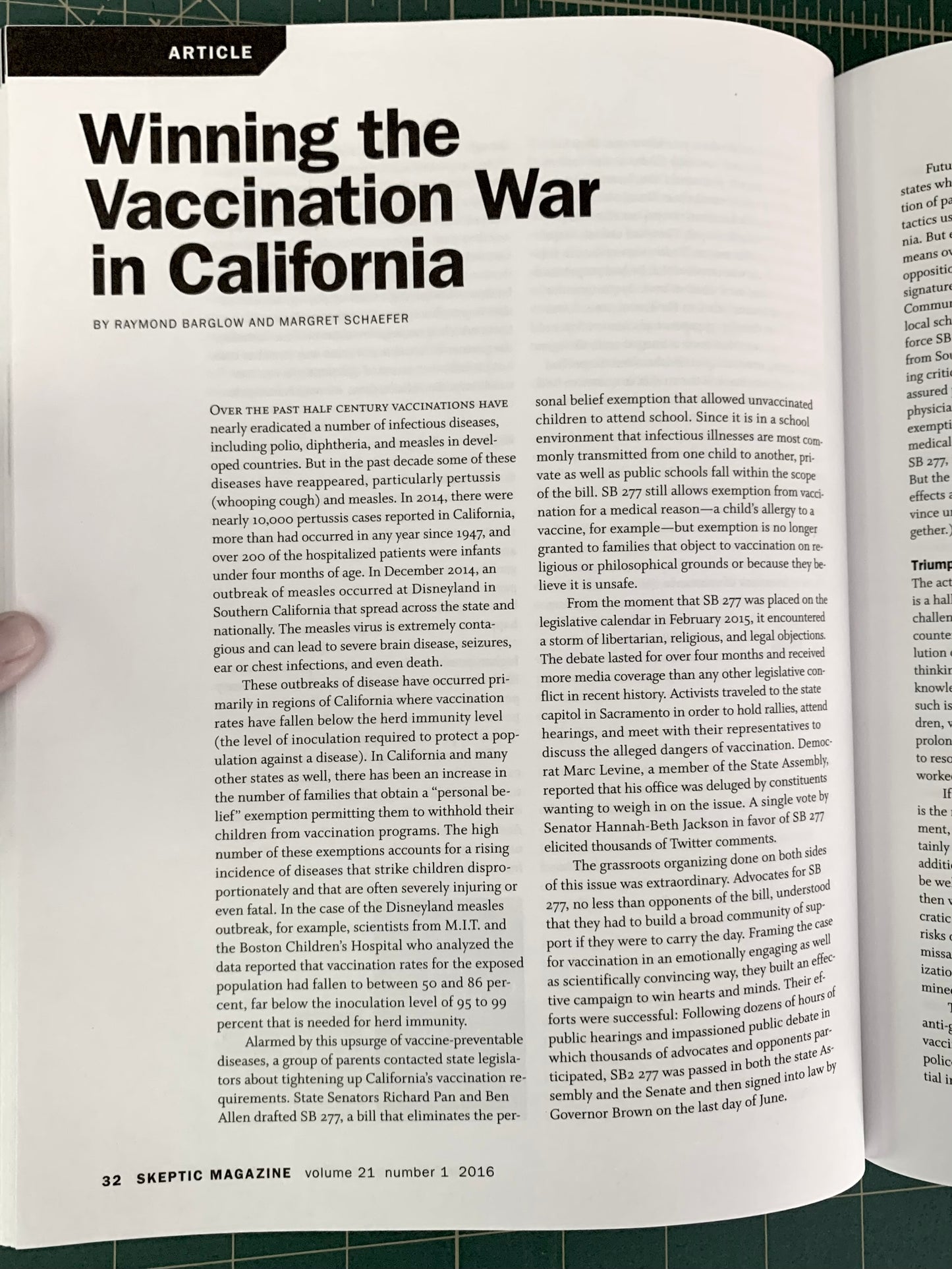 An open book showing a printed article page with the headline 'Winning the Vaccination War in California' and multiple columns of text.
[additional_image_link]