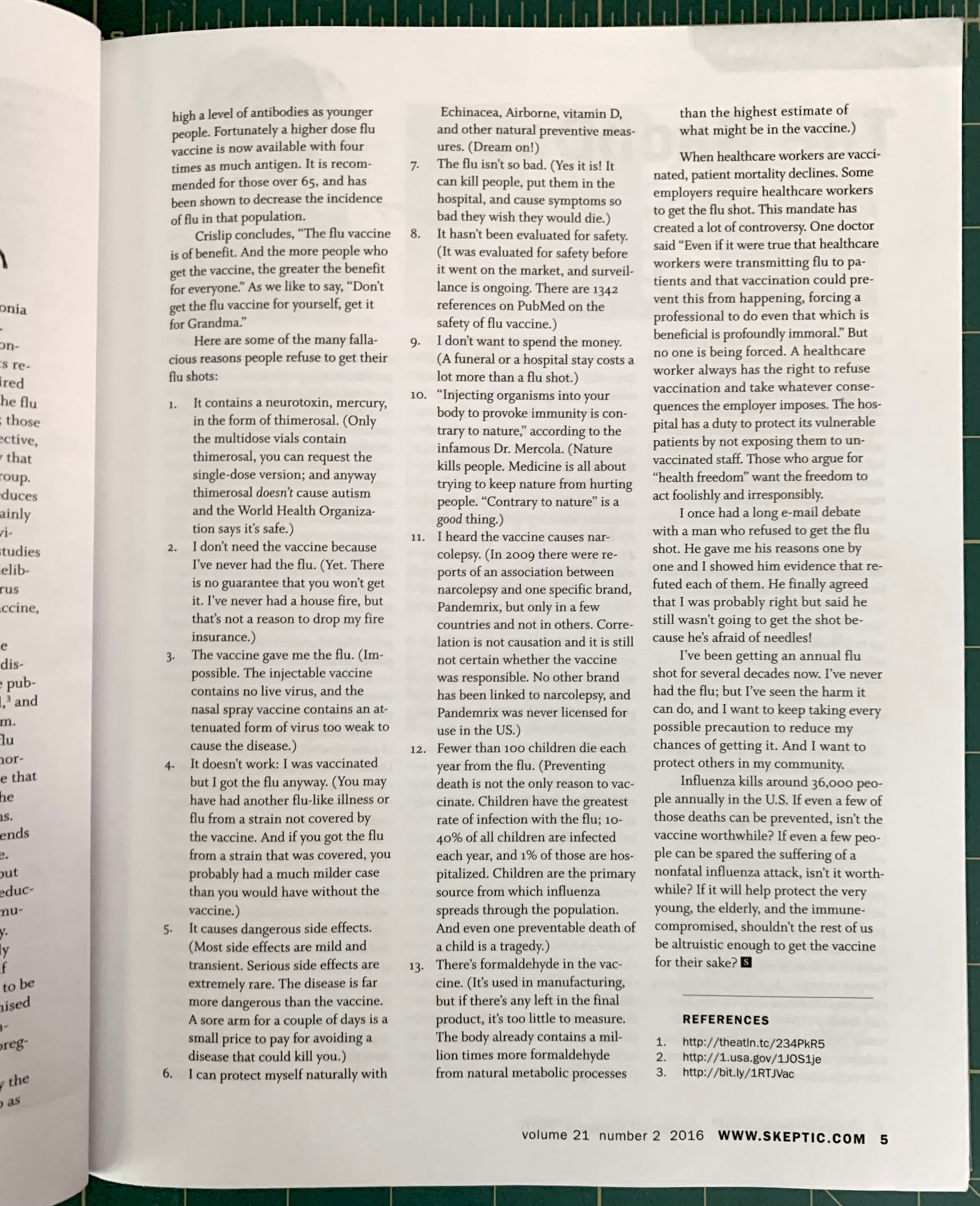 An open book page showing printed text about vaccines, with columns of black text on a white page and a small website watermark at the bottom.
[additional_image_link]
