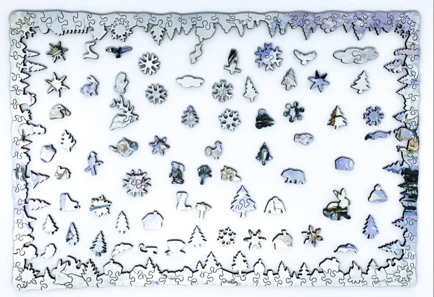 A jigsaw puzzle depicting a winter scene with a path, fence, and trees, predominantly in shades of white and blue by Claude Monet.
Photo by Nautilus Puzzles [additional_image_link]