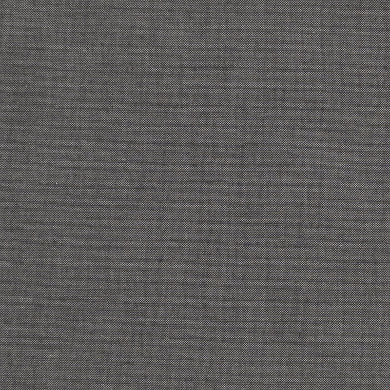 A dark gray solid fabric from the Chambray Basics collection.
Photo by Tildafabrics.com [image_link]