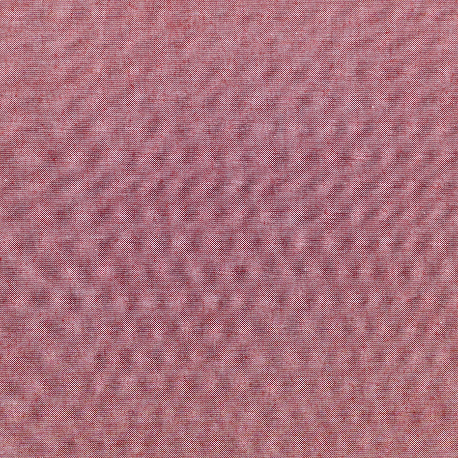 A remnant piece of Chambray Basics Red fabric with a visible textured weave.
Photo by Tildafabrics.com [image_link]