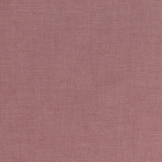 A 7.25 inch remnant piece of Chambray Basics Rosewood fabric with a solid pink color and a soft, rustic texture.
Photo by Tildafabrics.com [image_link]