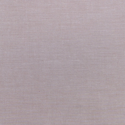 A piece of Chambray Basics Sand fabric with a solid beige color and a textured weave.
Photo by Tildafabrics.com [image_link]