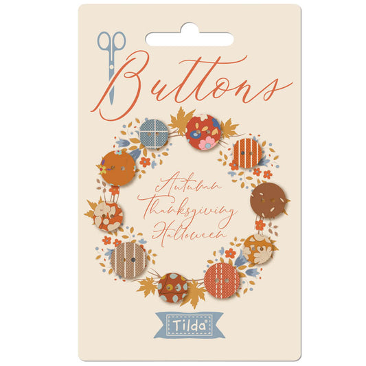 Packaging of Tilda buttons with autumn-themed design on a beige background.
Photo by Tildafabrics.com [image_link]