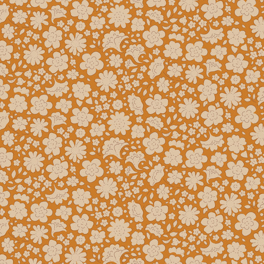 A fabric from the Tilda Creating Memories collection featuring a floral pattern in shades of saffron, brown, and rust.
Photo by Tildafabrics.com [image_link]