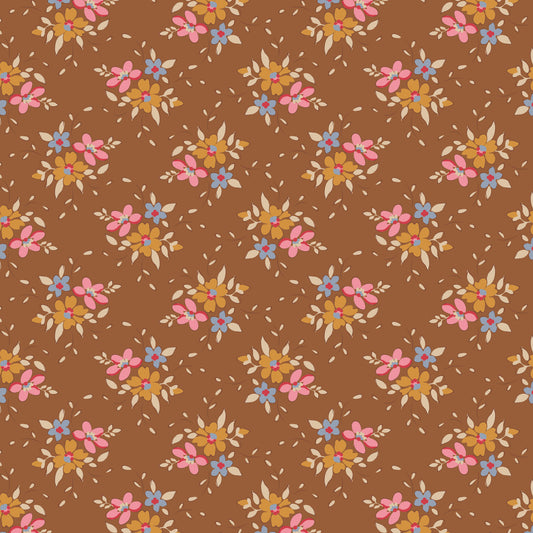 A repeating floral pattern on a warm brown background, featuring small pink, yellow, blue, and cream flowers arranged in rows.
Photo by Tildafabrics.com [image_link]