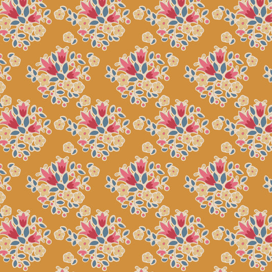 A repeating floral pattern on a warm mustard-orange background, featuring cream flowers with pink centers and blue-green leaves.
Photo by Tildafabrics.com [image_link]