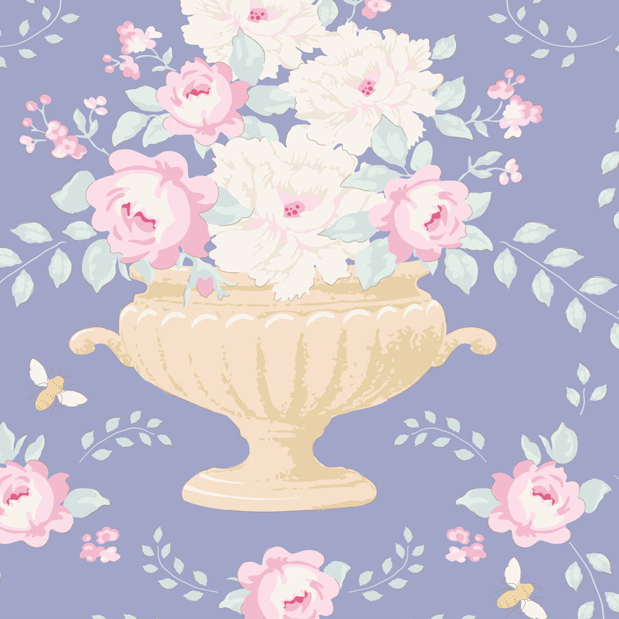 A repeating floral pattern featuring a central cream-colored urn filled with large pink and white flowers, surrounded by pale green leaves and small butterflies on a blue/lavender background.
Photo by Tildafabrics.com [image_link]