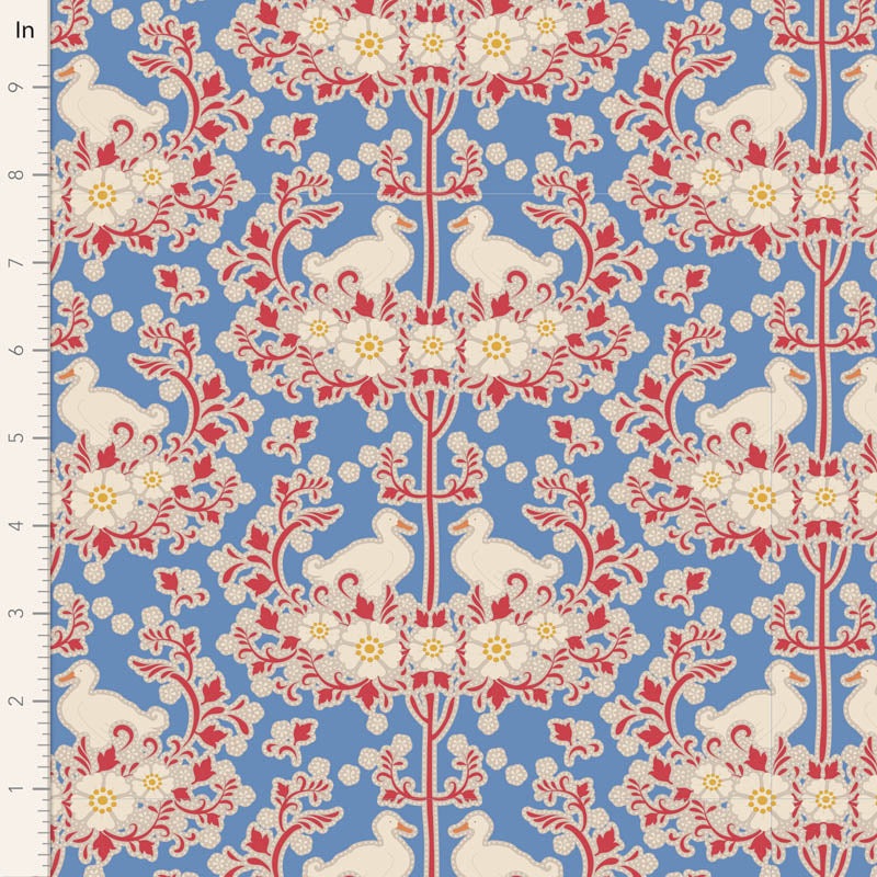 A yardage sample of Tilda Jubilee Duck Nest Blue fabric featuring a blue background with a red and white floral pattern.
Photo by Tildafabrics.com [image_link]
